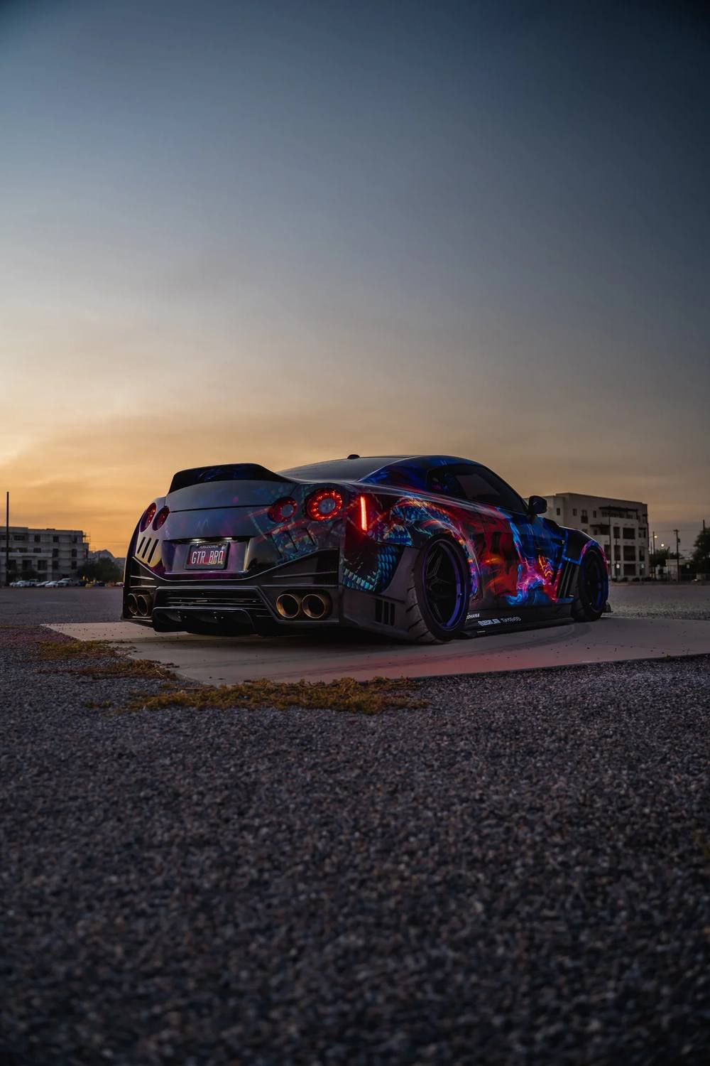 Wrapped Nissan GT-R at sunset