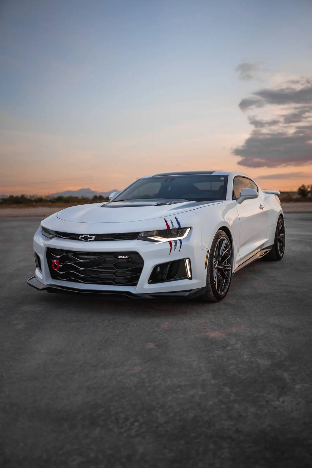 White Camaro ZL1 at dusk