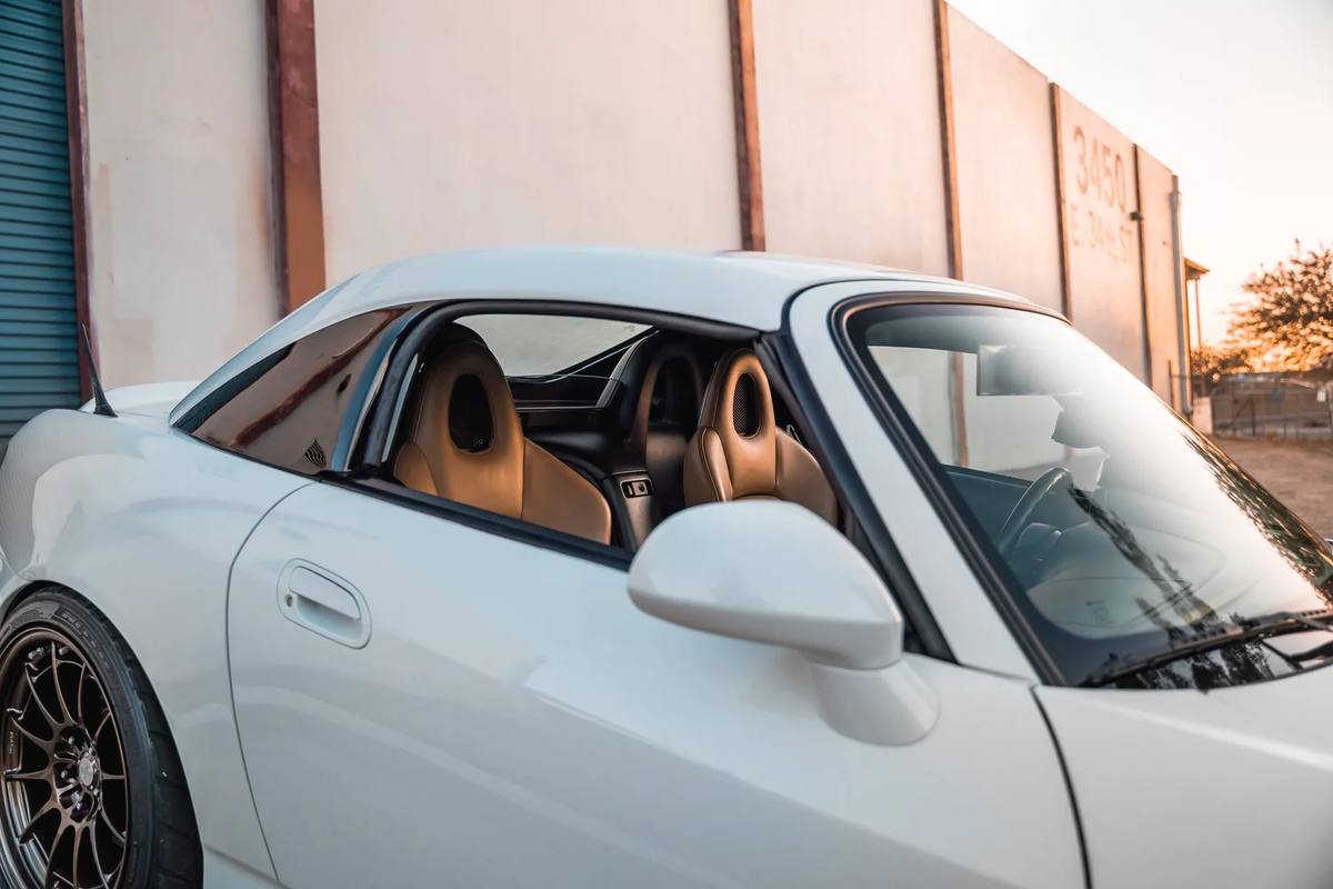 White roadster with a tan interior