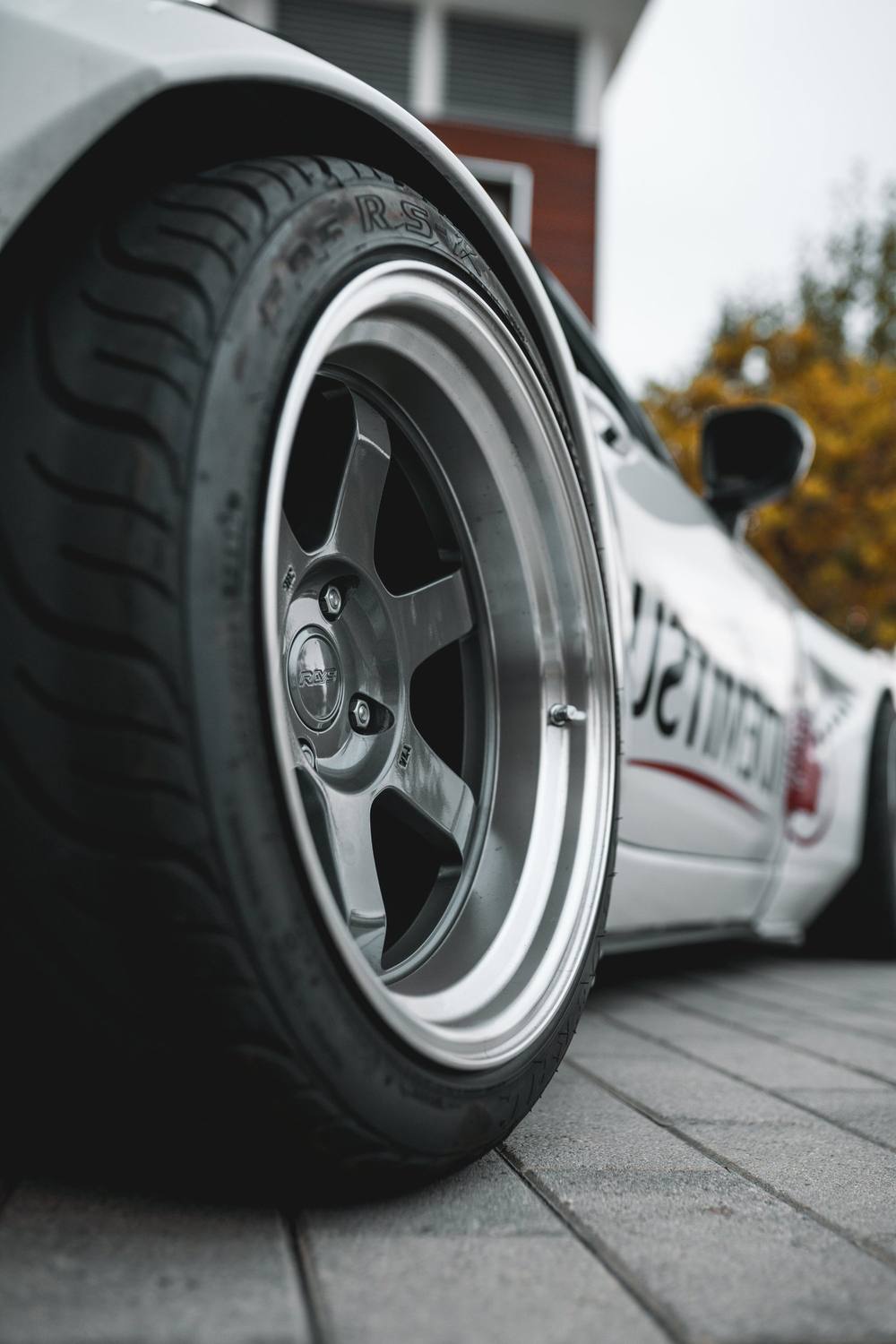 Deep-dish wheel on a white race car